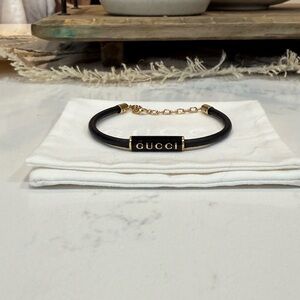 Gucci Black Bracelet with Gold Chain purchased 8/25/2025